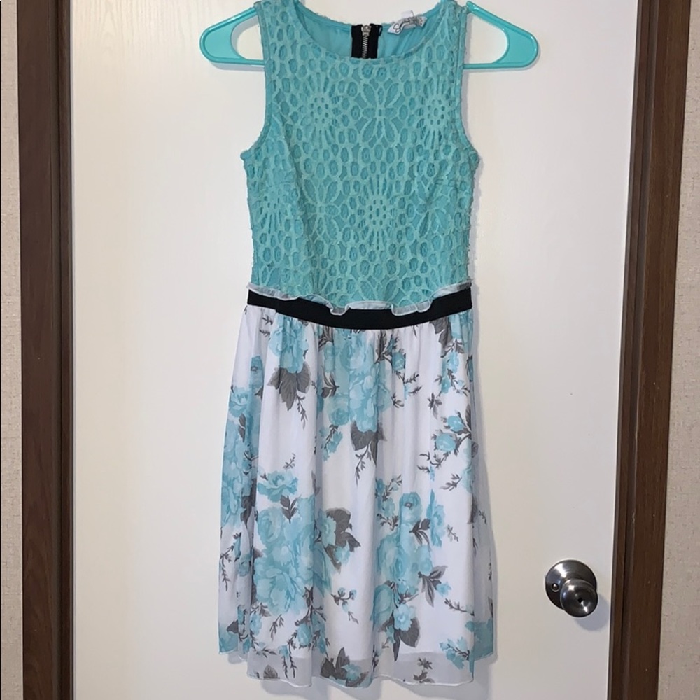Tiffany blue dress with flower detail.